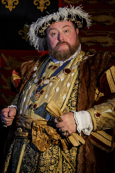 John White, performance historian, as King Henry VIII